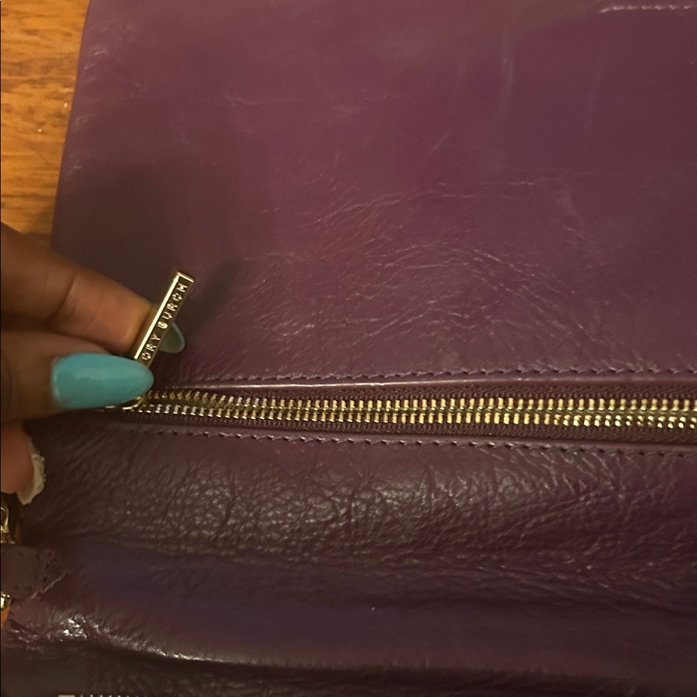 Tory Burch Plum/egg plant Leather Clutch with Gold Accents. - Picture 9 of 16